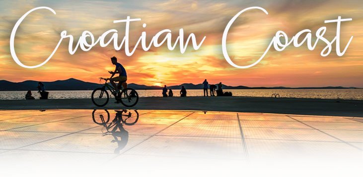 Cyclist on the Croatian coast at sunset
