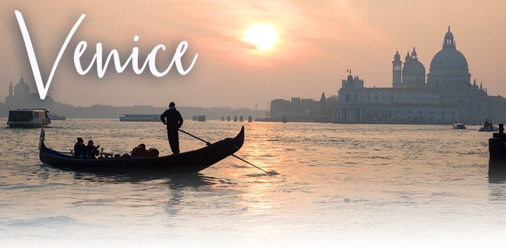 Gondola on a Venice canal at sunset