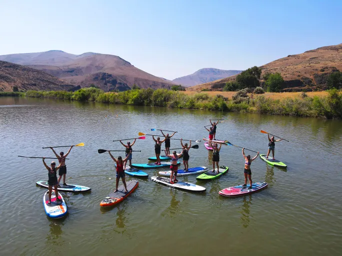 A Girls with Grit stand up paddleboard