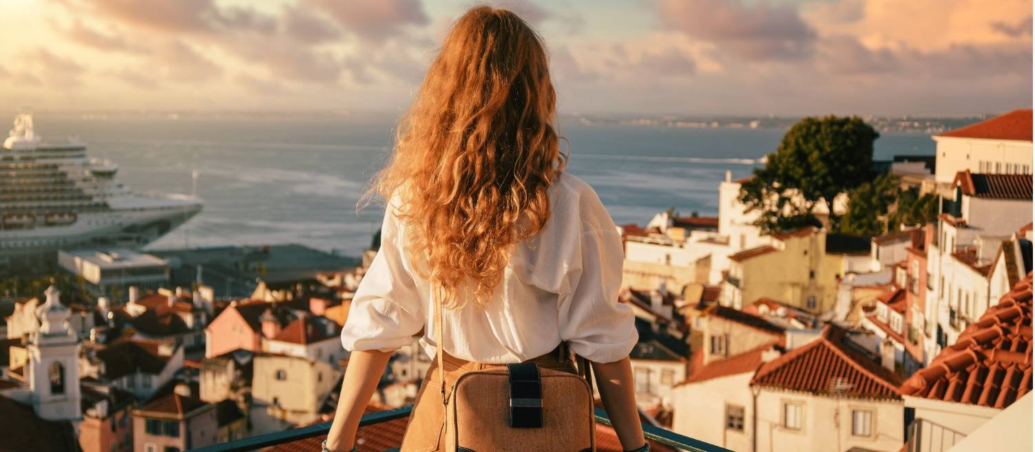 Woman overlooking Lisbon, Portugal