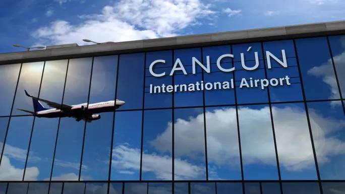 Airplane landing at Cancun International Airport. Airplane landing at Cancun International Airport