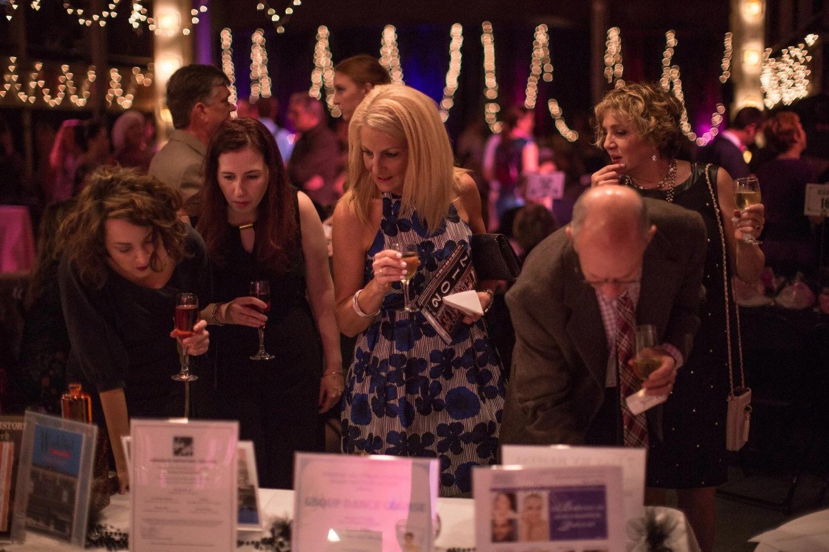 Guests enjoying an evening charity fundraising event